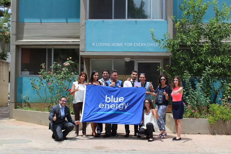 The Blue Energy team from Hilton Hotels draws a smile on the children faces